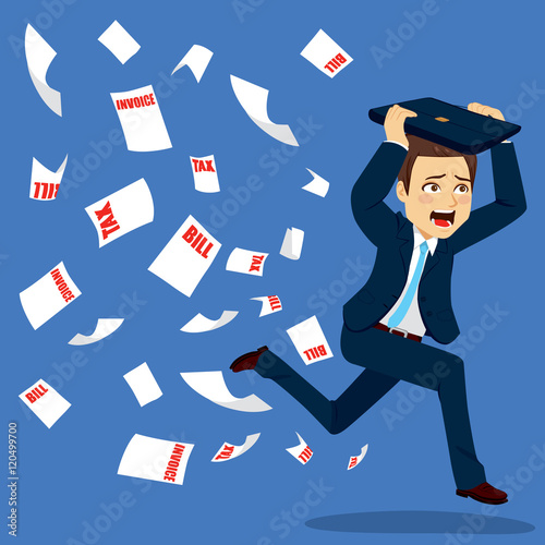 Young businessman running a...