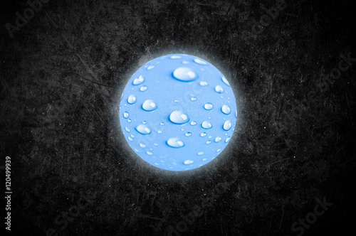 Planet with drops of water on a color background. Collage