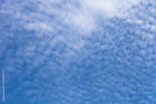 White clouds on a blue sky. Selective focus