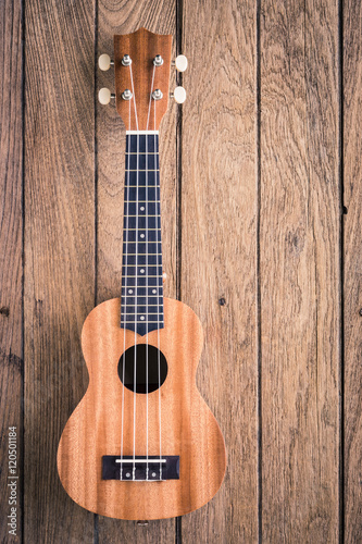 ukulele on old wodden background