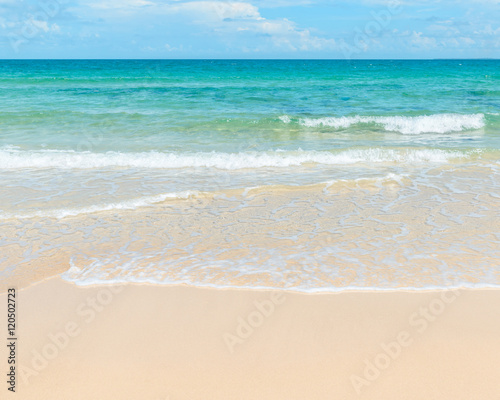 Clear azure sea and sandy beach