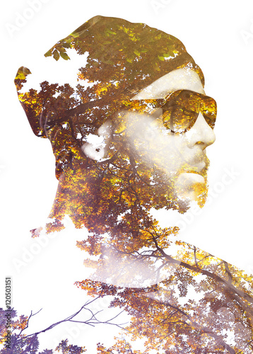 Fototapeta Naklejka Na Ścianę i Meble -  Double exposure portrait of male combined with branches and trees. Gradient effect applied. Vintage look.