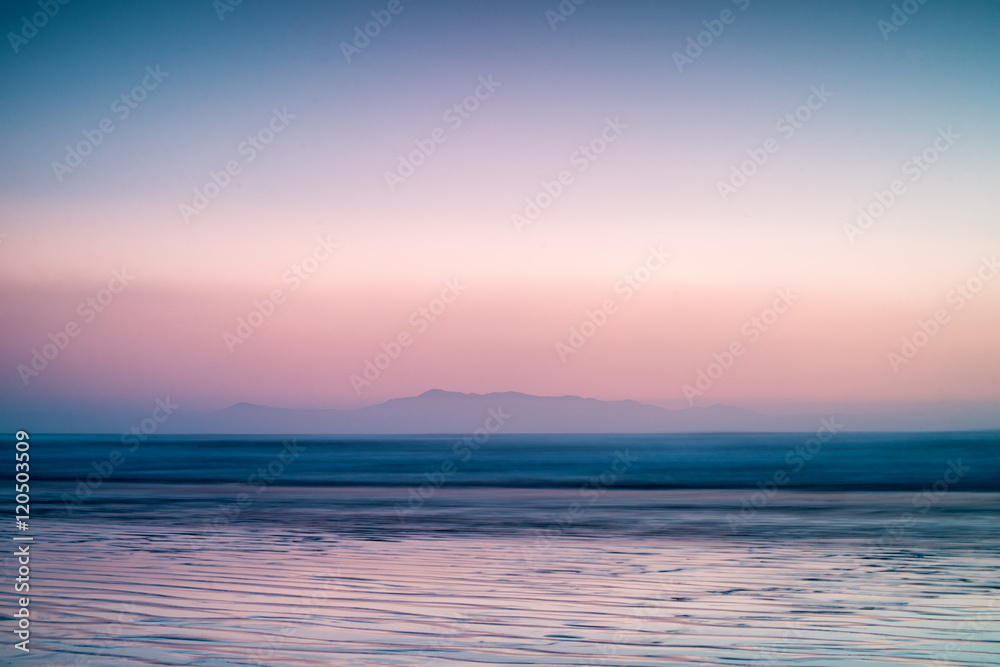 Sunset beach and mountain