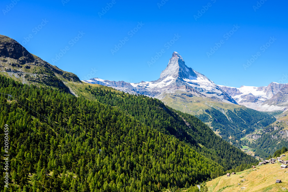 Fototapeta premium Matterhorn - small village with houses in beautiful landscape of Zermatt, Switzerland