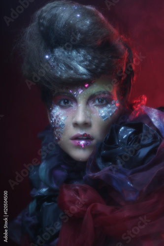 Portrait of young stylisn woman with creative visage. © Raisa Kanareva