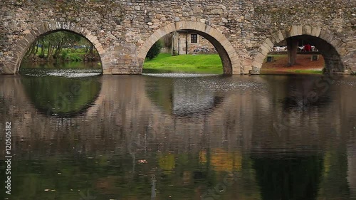 Arcos de Puente de Piedra en el Rio. Molinaseca. El Bierzo, Provincia de Leon. España photo