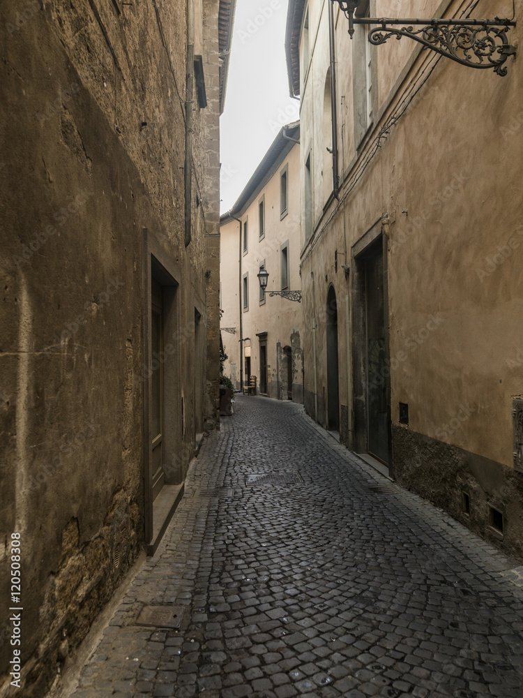 Buildings along a narrow cobblestone street, Orvieto, Terni Prov