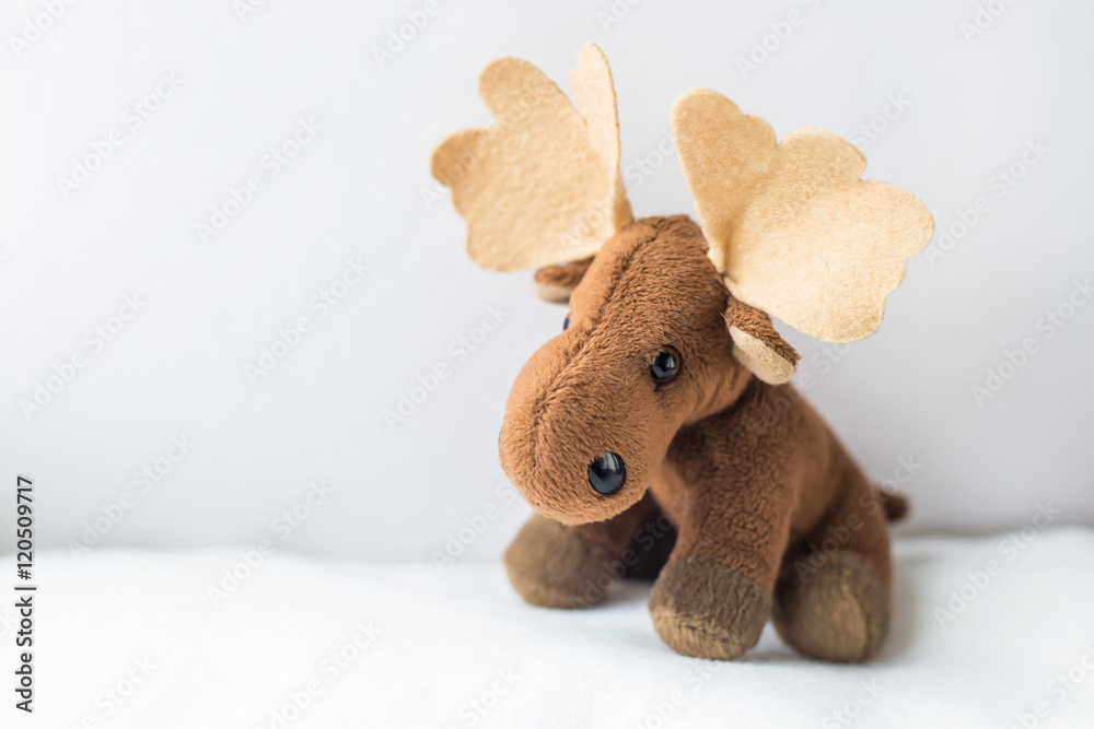 Fototapeta premium cute baby elk toy on white background