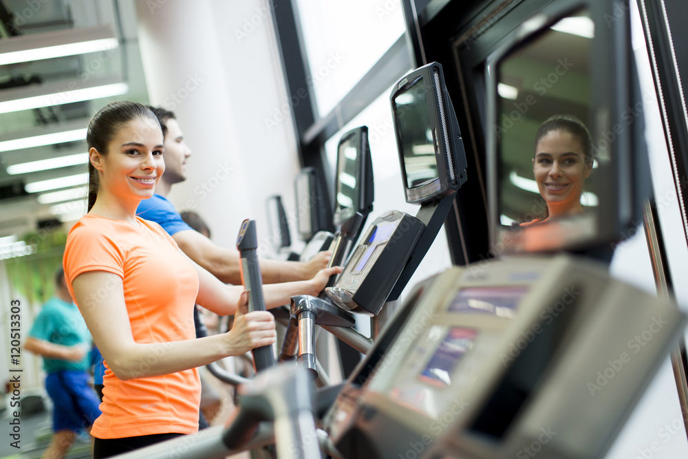 Fototapeta premium Young woman in the gym