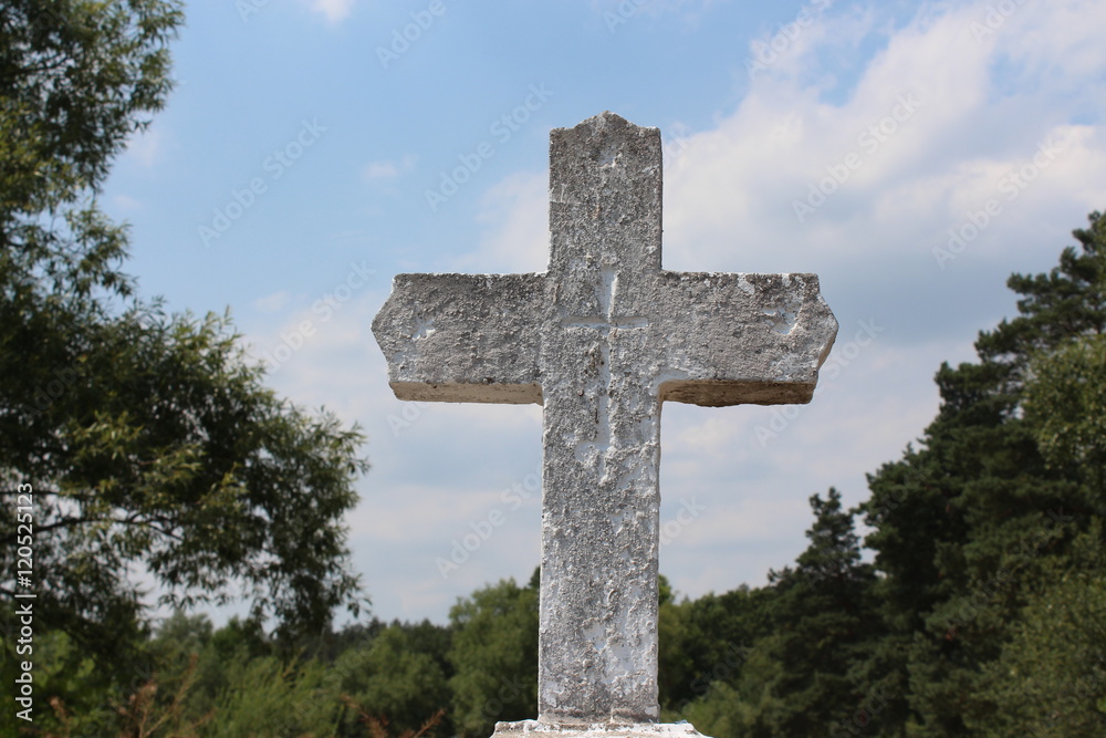 old christian style cross made out of stone old christian style cross made out of stone