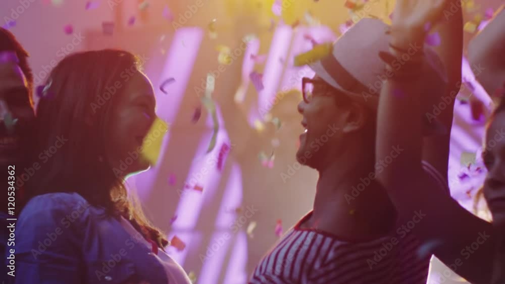 People Dancing, Having Fun and Raising Hands in Nightclub. Shot on RED Cinema Camera in 4K (UHD). People Dancing, Having Fun and Raising Hands in Nightclub. Shot on RED Cinema Camera in 4K (UHD).