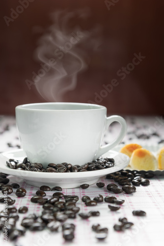 Coffee cup and coffee beans