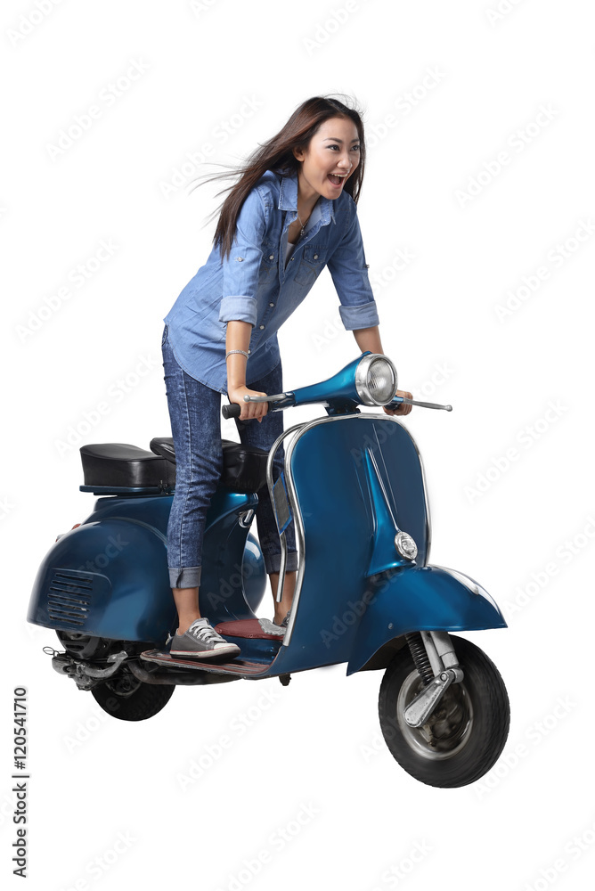Fototapeta premium Asian woman riding scooter
