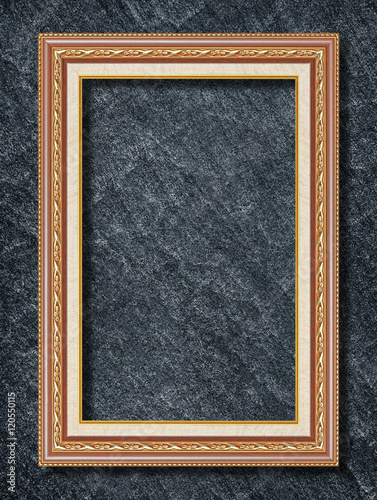 gold frame on black slate background