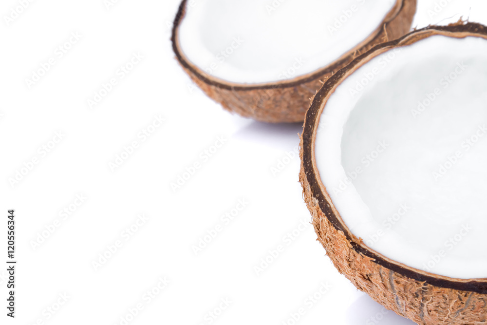 Closeup half of brown coconut shell on white background Closeup half of brown coconut shell on white background