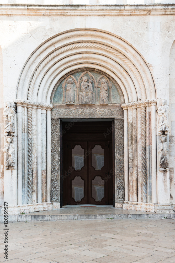 Detail of portal into Saint Anastasia Cathedral in Zadar, Croatia