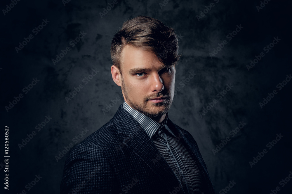 Fototapeta premium Portrait of stylish male in a suit.
