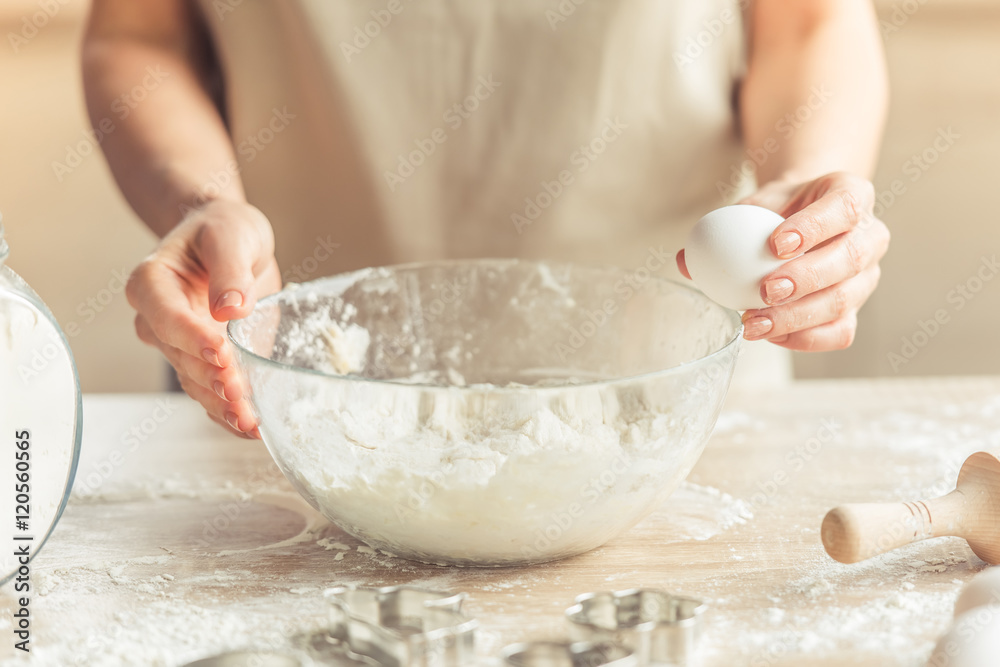 Fototapeta premium Beautiful woman baking