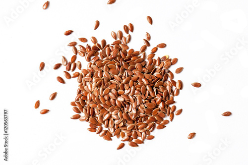 Flax seeds on white background photo