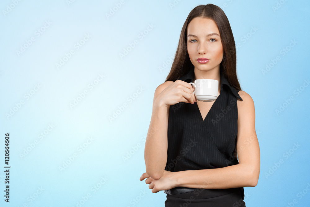 Portrait of a young woman with cup of tea or coffee Portrait of a young woman with cup of tea or coffee