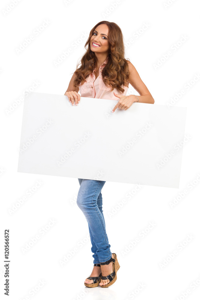 Beautiful Girl Holding White Poster And Pointing Beautiful Girl Holding White Poster And Pointing