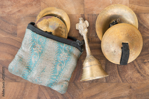 Bell and splash cymbals [Manjira] for Hindu festival of lights preparation photo