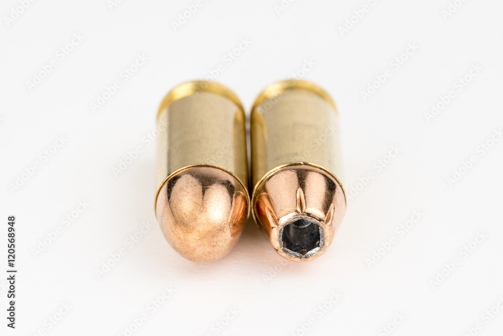 45 ACP hollowpoint vs full metal jacket Stock Photo | Adobe Stock