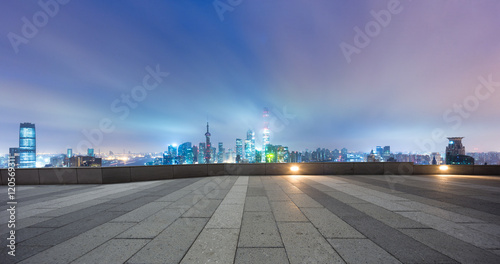 Photography cityscape and skyline of shanghai from empty brick floor