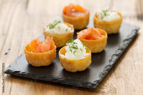 salmon with fresh cheese on board