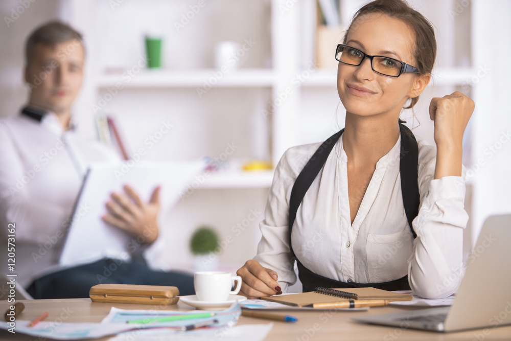 Attractive businesswoman doing paperwork Attractive businesswoman doing paperwork