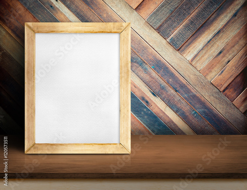 white board on plain wooden table top at diagonal tropical wood