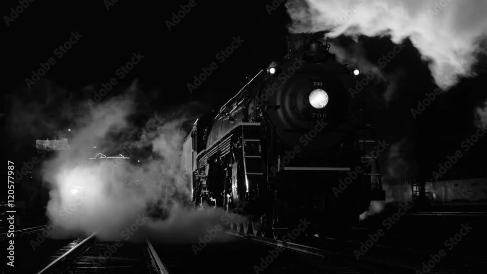 Steam locomotive at night  in black and white