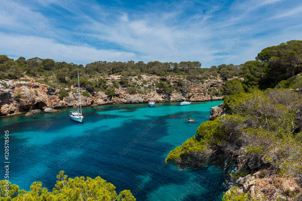 Naklejka premium Sail yachts in bay near Cala Pi, Mallorca, Balearic Islands, Spain.