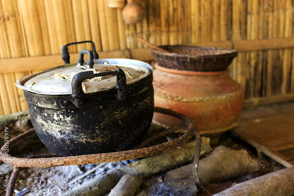 Tribal Kitchen in Northern Thailand. over light Tribal Kitchen in Northern Thailand. over light