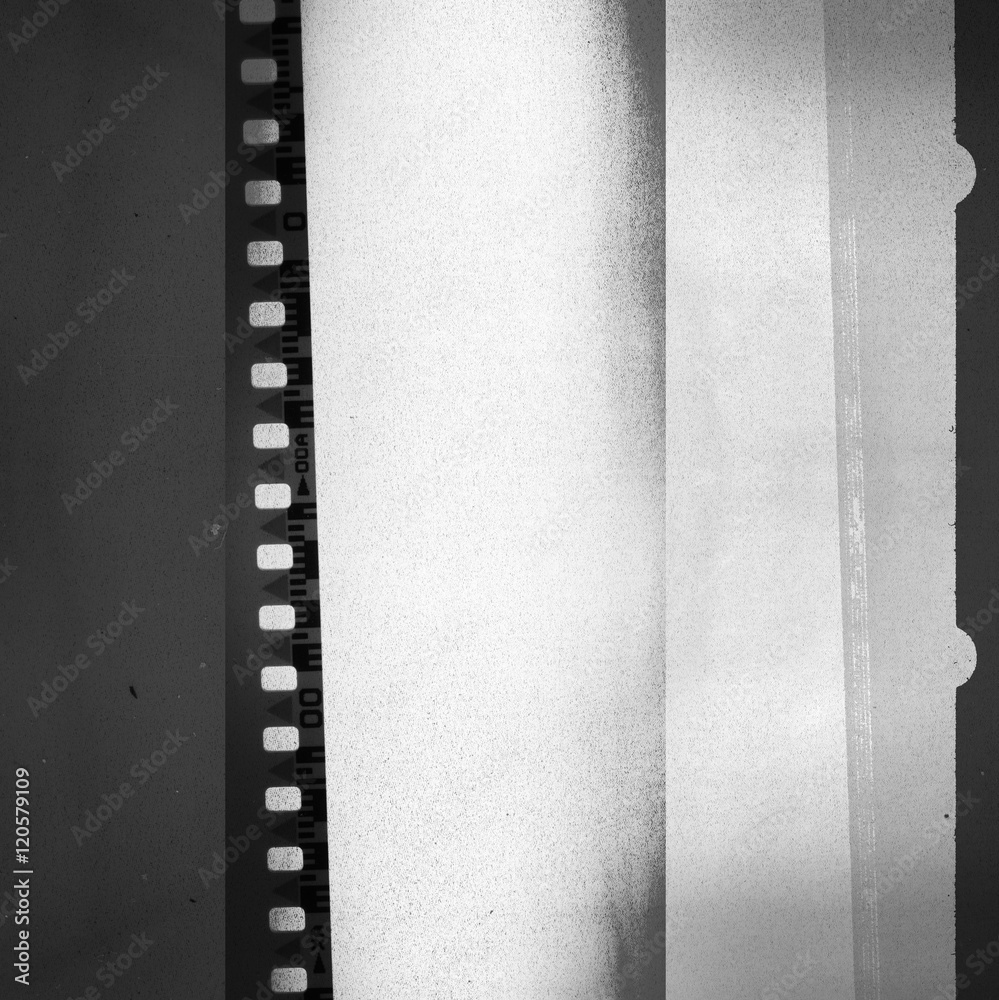Camera filmstrip negative background texture (black and white) Camera filmstrip negative background texture (black and white)