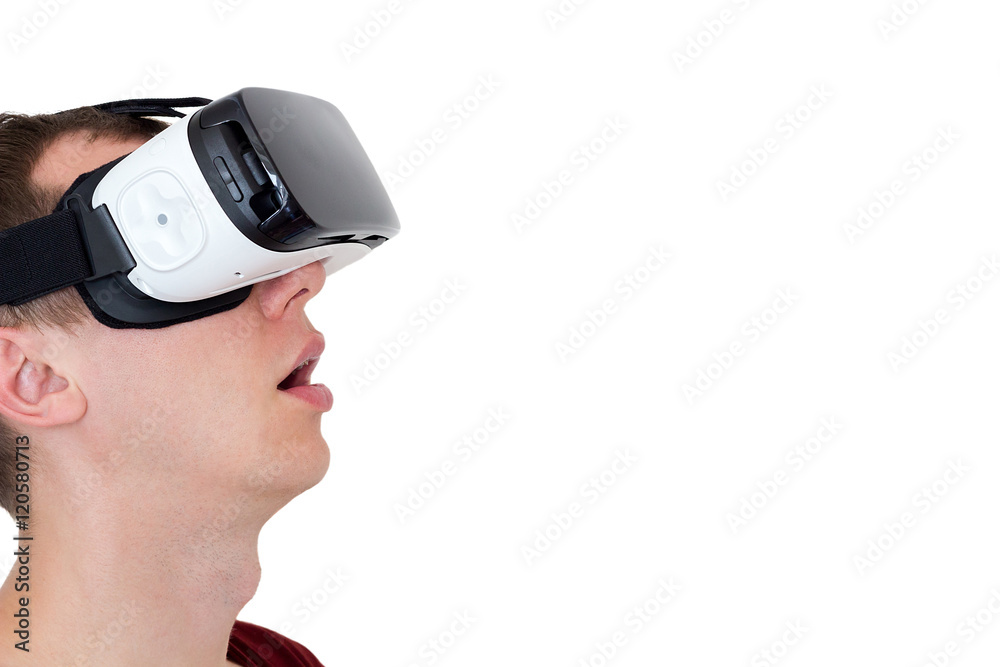 surprised man using virtual reality glasses, isolated