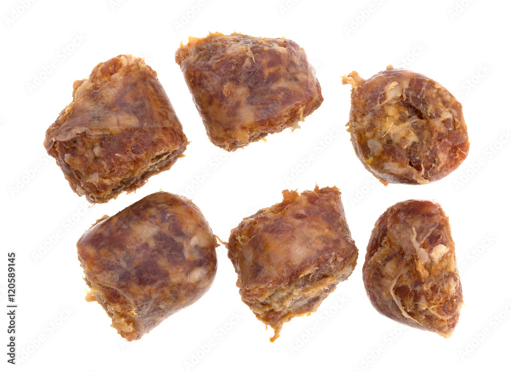 Bratwurst chunks on a white background. Bratwurst chunks on a white background.