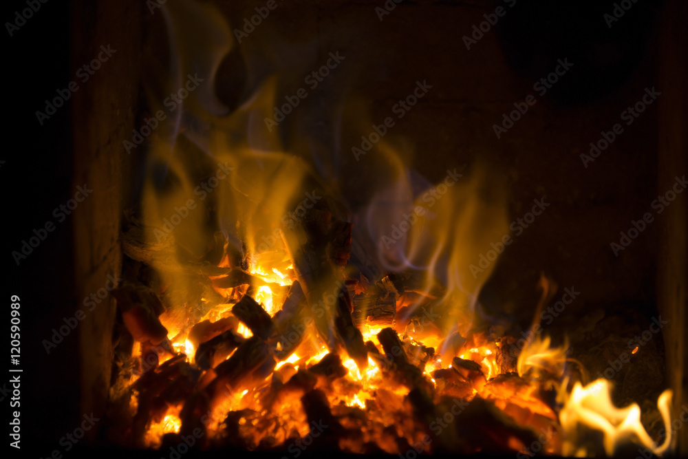 Fire in the fireplace. A good way of warming up the house with a romantic angle. Fire in the fireplace. A good way of warming up the house with a romantic angle.
