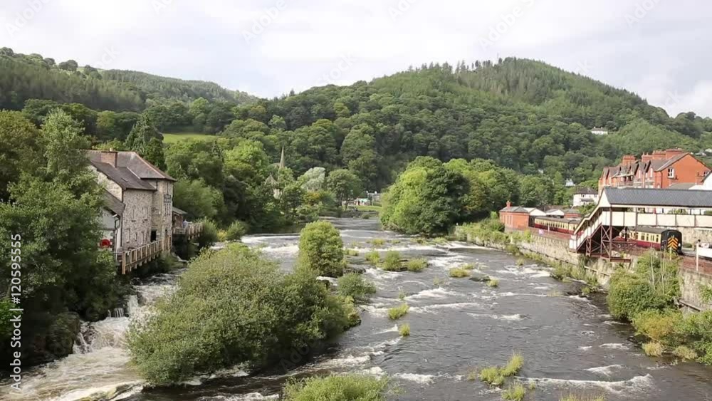 Llangollen Wales uk River Dee fast flowing white water through the beautiful Welsh tourist destination Llangollen Wales uk River Dee fast flowing white water through the beautiful Welsh tourist destination