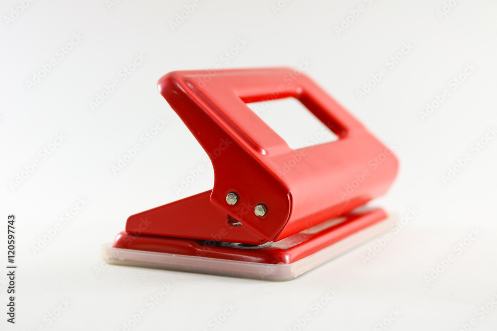 Red puncher on white background isolated. Red puncher on white background isolated.