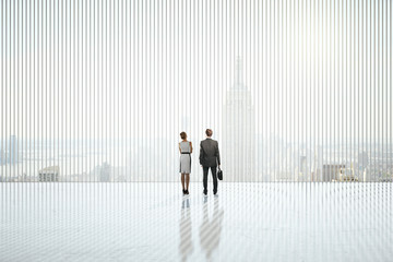 Businesspeople in abstract interior