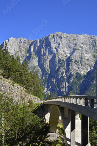 The Slovenian side of the Italian Slovenian border near the start of the Mangrt road. This road crosses the Predelica Ali Predilnica river. 