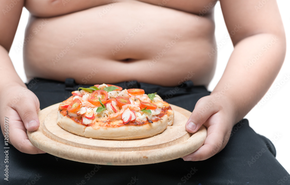 Pizza in wood plate with obese fat boy background Pizza in wood plate with obese fat boy background