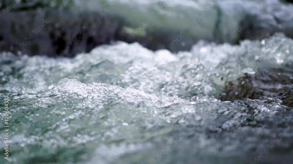 Water splash with bubbles in 4K