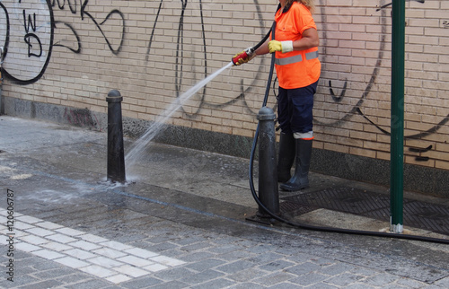 City workers - cleaning and washing of city streets