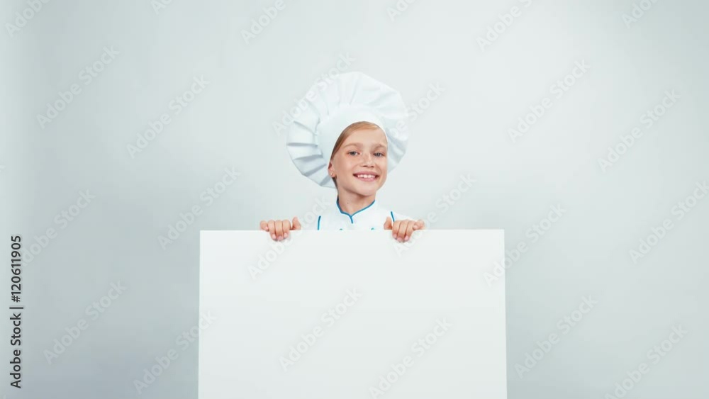 Chef cook looking at white board and smiling at camera. Isolated on white Chef cook looking at white board and smiling at camera. Isolated on white