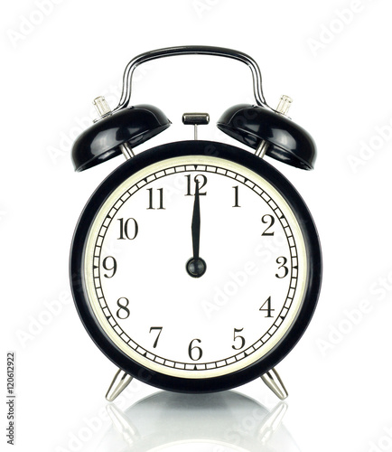 Alarm Clock isolated on white, in black and white, twelve o'clock.