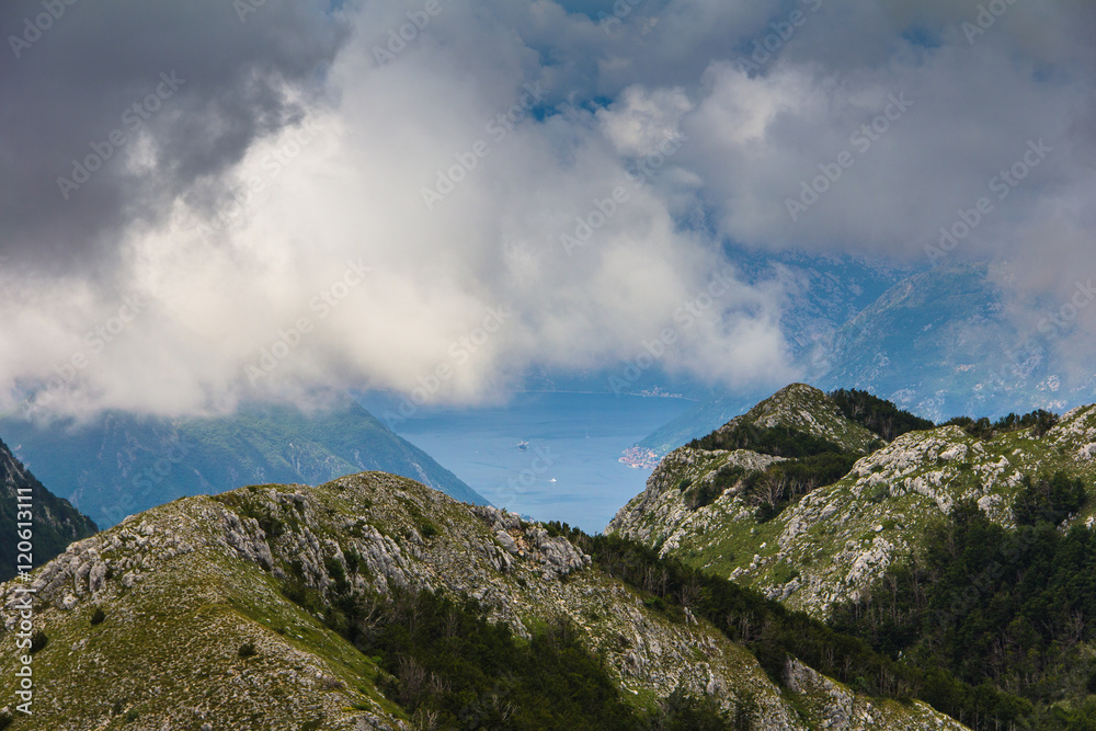 View of  mountain slopes are rocky and Kotor bay in the distance. Lovcen National Park. Montenegro.