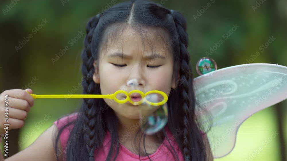 Girl in fairy princess costume blowing bubbles, shot on Phantom Flex 4K Girl in fairy princess costume blowing bubbles, shot on Phantom Flex 4K