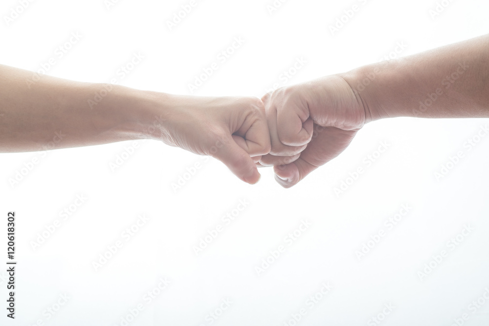 male and female doing fist bump